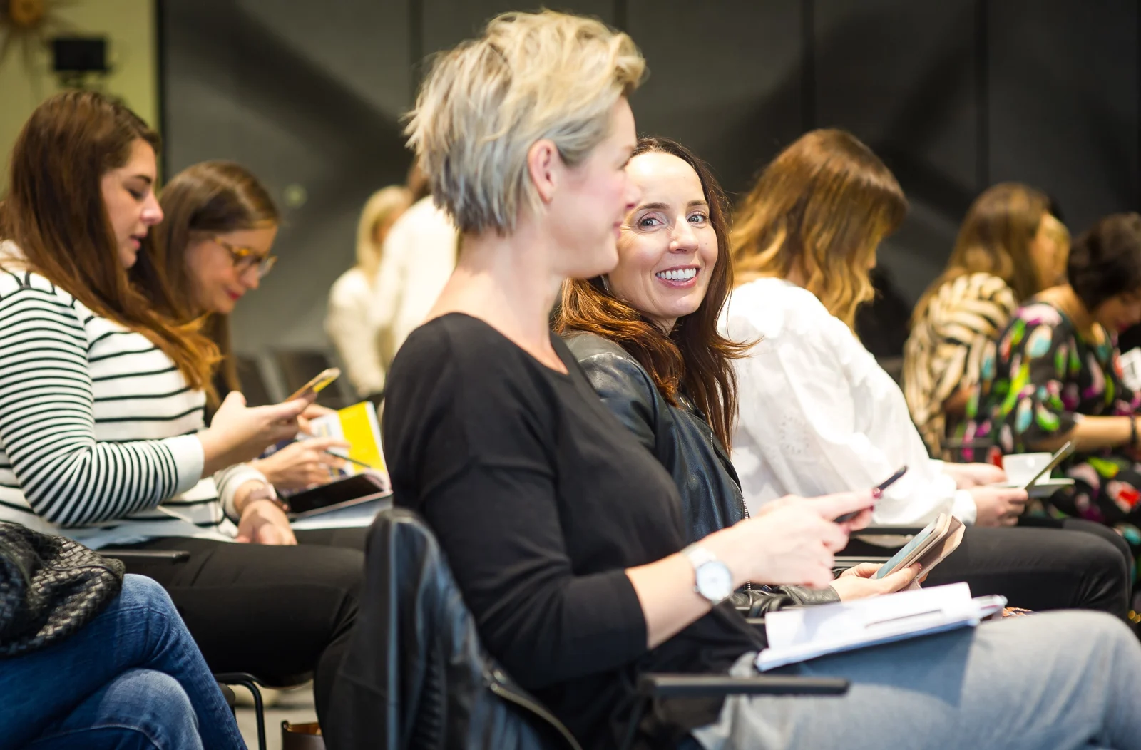 Women connecting at a TRW event